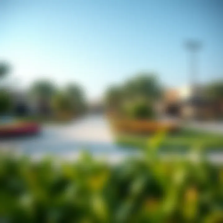 Community park in Mudon Arabella with lush landscaping and recreational facilities